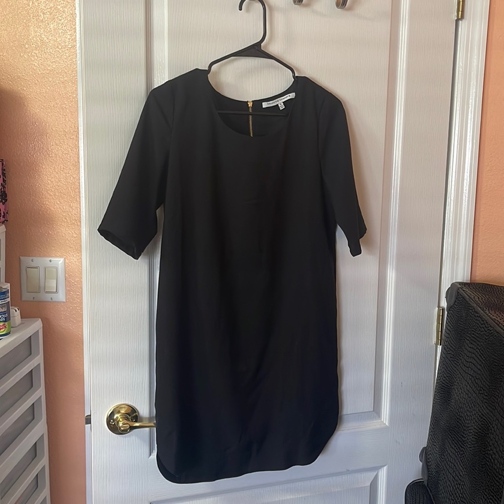 Collective concept black dress